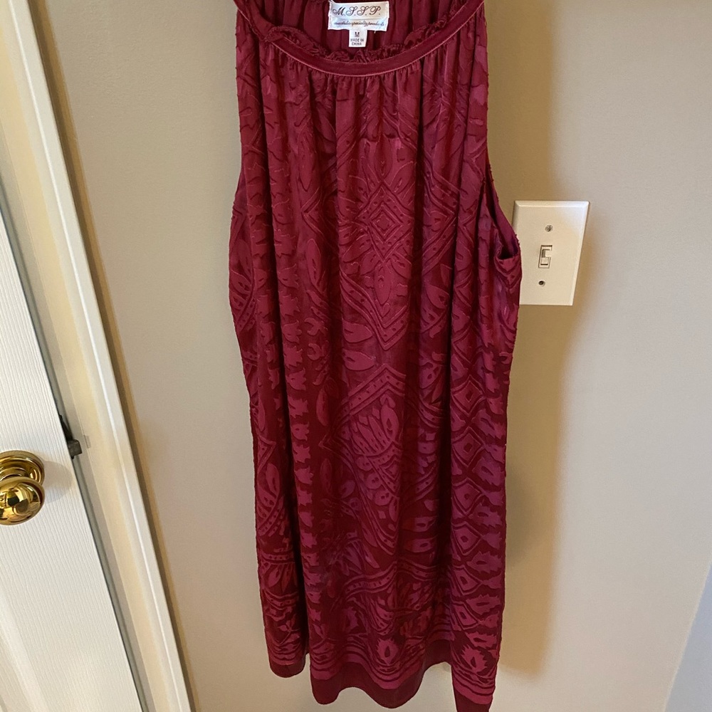 Red dress with velour detailing. Size M.
